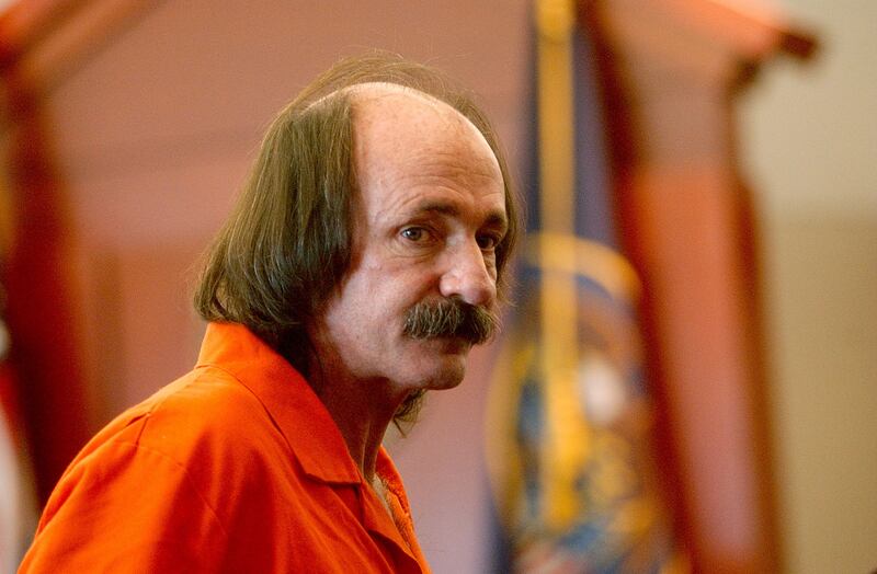 Richard Ricci leaves court after a roll call hearing.