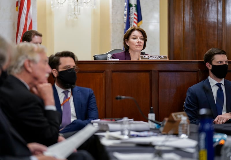 Sen. Amy Klobuchar looks over the Senate Rules committee while presiding over a markup of the “For the People Act” in Washington.