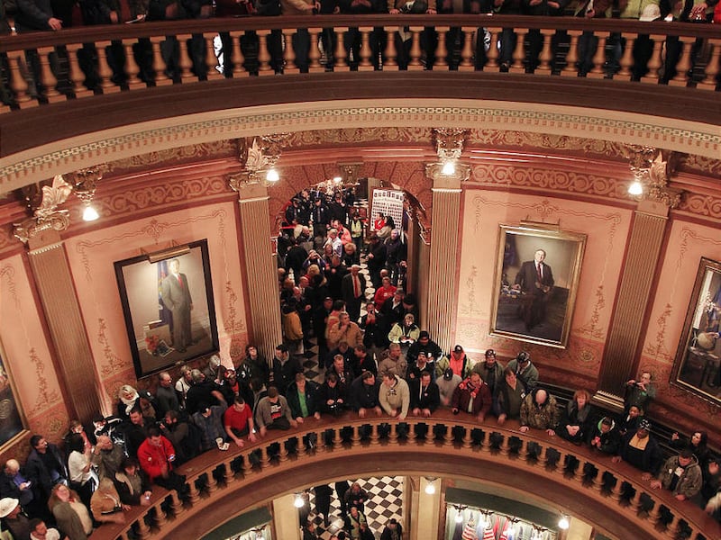 Pro-union protesters fill the capitol in Lansing, Mich., duirng debate on the bill in December.