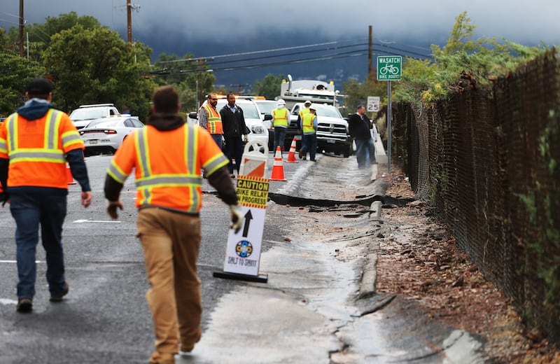 Repair crews respond to a water main break between Wasatch Boulevard and I-125 east in Millcreek on Friday, Sept. 22, 2017. The issue of water infrastructure, water delivery area and fair treatment of ratepayers has caught Utah lawmakers’ attention.