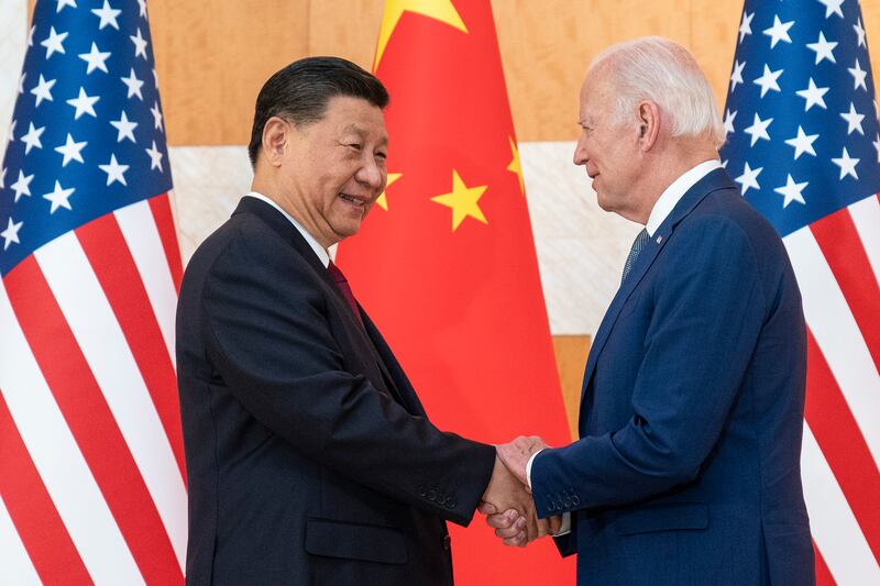 President Joe Biden, right, and Chinese President Xi Jinping shake hands at the G20 summit meeting, Nov. 14, 2022, in Bali.