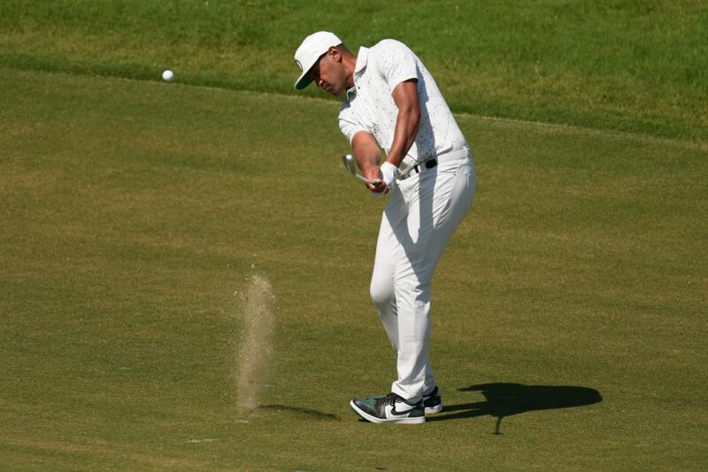 Tony Finau swings his club