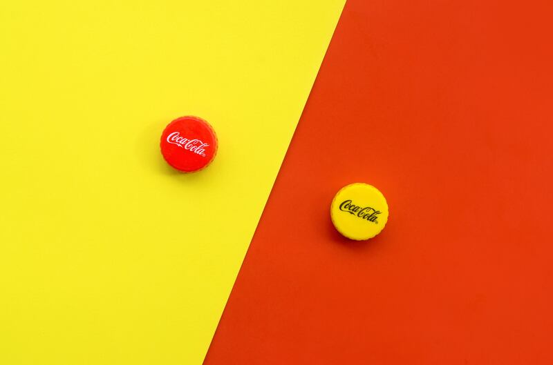 Some Coke bottles will be sealed not with the well-known red caps, but instead with yellow ones, as part of the Passover holiday.