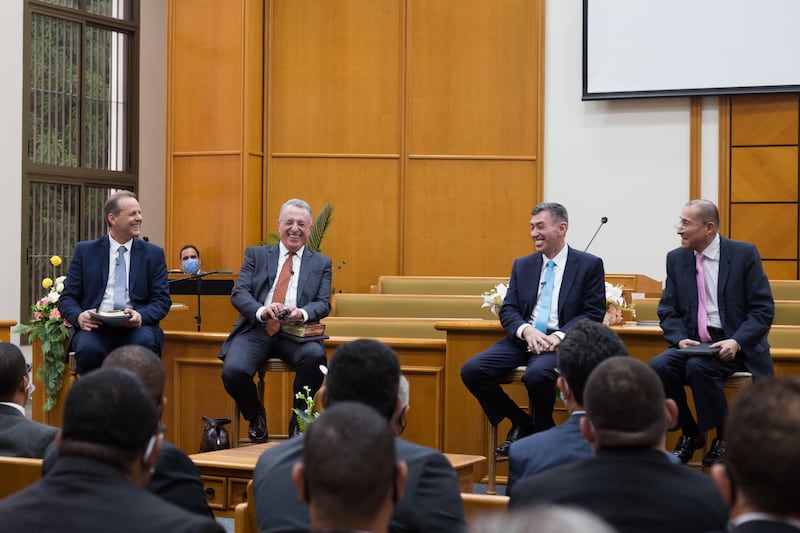 Elder Ulisses Soares, second from left, of the Quorum of the Twelve Apostles, enjoys a moment with the Brazil Area Presidency.