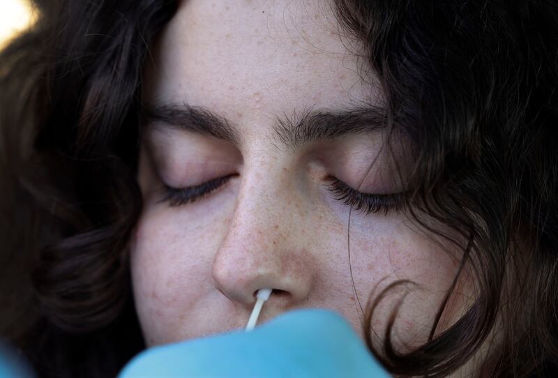 Emilia Lewis gets a COVID-19 test.