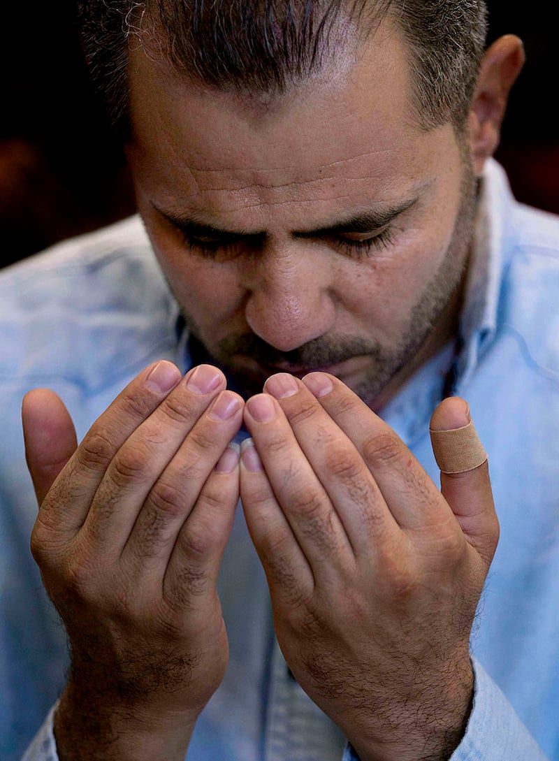 Malek Hamad prays on Eid al-Fitr at the Khadeeja Islamic Center in West Valley on June 25, 2017. Malek appreciates the religious freedoms that come with living in America.
