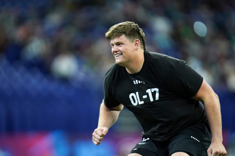 BYU offensive lineman Blake Freeland runs a drill at the NFL scouting combine Sunday, March 5, 2023.