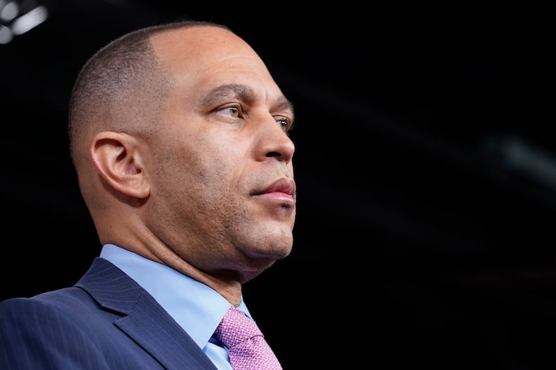 House Minority Leader Hakeem Jeffries, D-N.Y., listens during a news conference on March 30, 2023, in Washington.