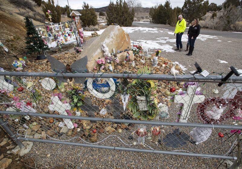 Amanda Hunt, right, visits a permanent memorial for her niece, Brelynne “Breezy” Otteson, and Otteson’s boyfriend, Riley Powell, near the Tintic Standard Mine No. 2 near Eureka, Juab County, on Feb. 4, 2021.