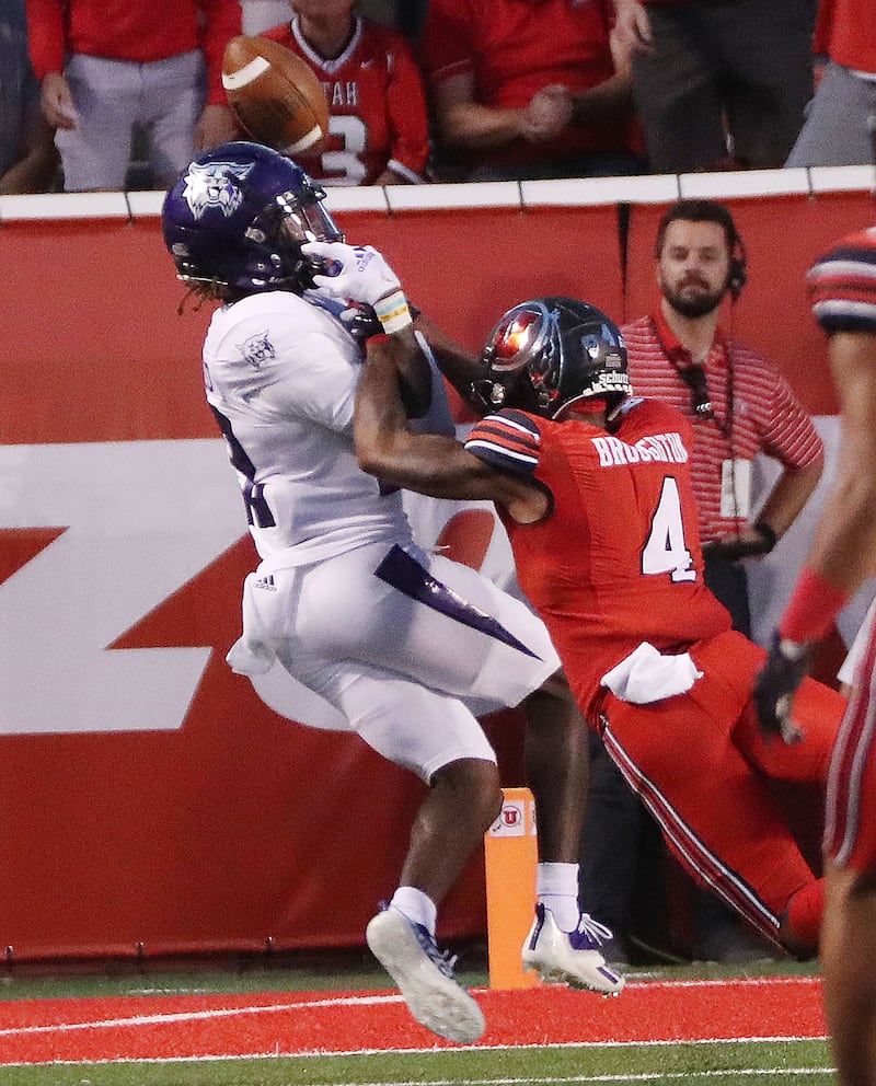 Utah Utes cornerback JaTravis Broughton (4) breaks up the pass intended for Weber State Wildcats wide receiver Rashid Shaheed