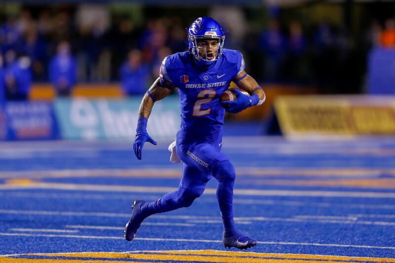 Boise State wide receiver Khalil Shakir (2) runs with the ball against Oklahoma State
