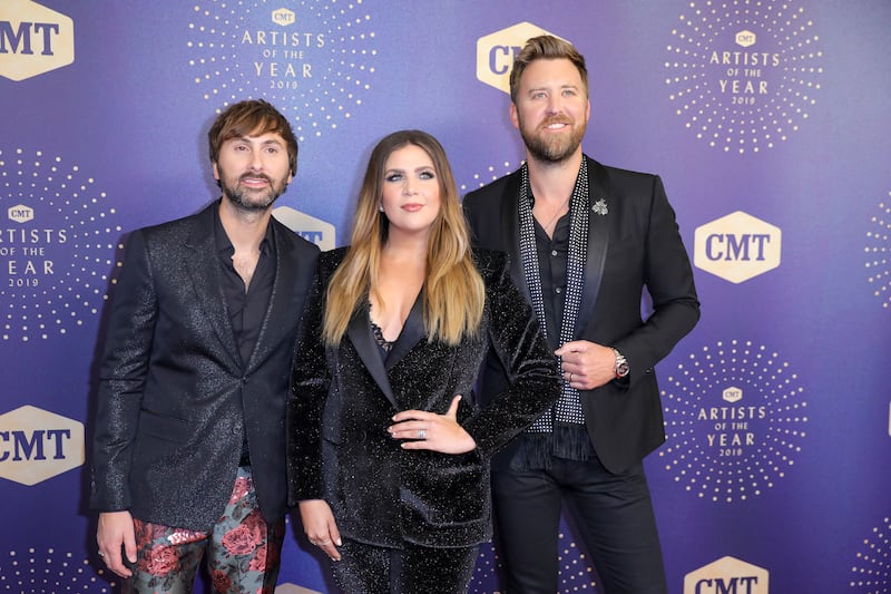 This Oct. 16, 2019 file photo shows Dave Haywood, from left, Hillary Scott, and Charles Kelley of Lady Antebellum at 2019 CMT Artists of the Year in Nashville, Tenn.