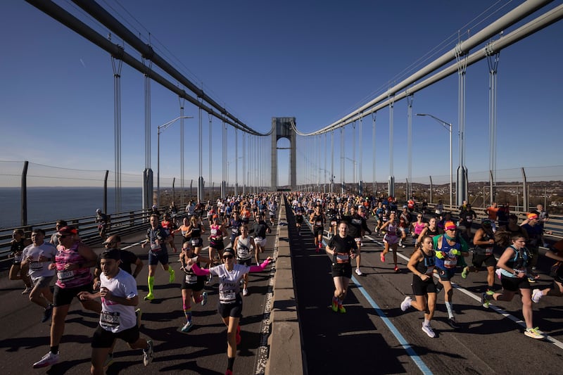 Runners cross the Verrazzano-Narrows Bridge at the start of the New York City Marathon, Sunday, Nov. 3, 2024, in New York.
