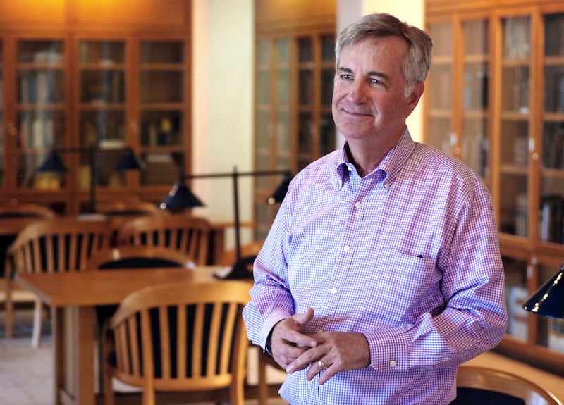 In this Tuesday, Sept. 11, 2018, photo, St. John's College President Mark Roosevelt talks about trends in student tuition and spending by colleges in Santa Fe, N.M. The college with campuses in Santa Fe and Annapolis, Md., is reducing its annual tuition p