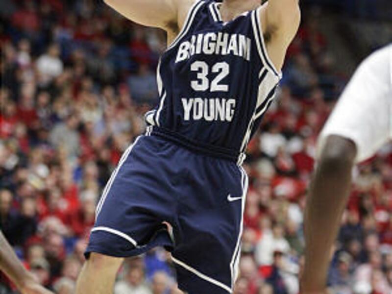 BYU guard Jimmer Fredette scored a BYU-record 49 points to lead the Cougars to a surprising blowout win against Arizona.