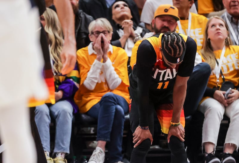 Jazz guard Mike Conley reacts during the game against the Mavericks Thursday at Vivint Arena in Salt Lake City.