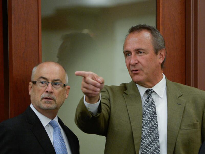 FILE - Former Utah Attorney General Mark Shurtleff, right, facing public corruption charges, appears in Judge Elizabeth Hruby-Mills courtroom alongside his attorney Richard Van Wagoner in Salt Lake City on Monday, Sept. 28, 2015, for a pre-trial hearing.