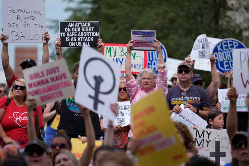 Abortion-rights activist rally at the Indiana Statehouse following the Supreme Court’s decision to overturn Roe v. Wade.