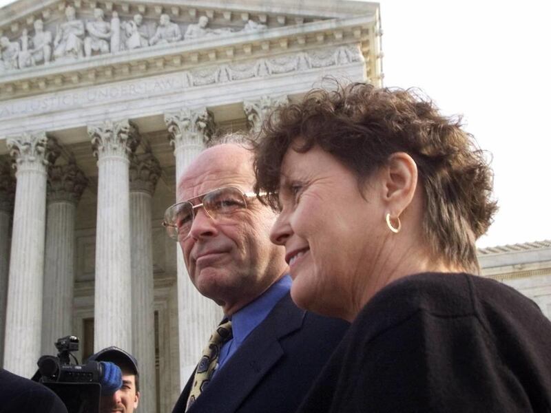Jennifer and Gary Troxel leave the Supreme Court in Washington, Wednesday Jan. 12, 2000, as they try to regain the right to see their granddaughters Natalie, 10, and Isabelle, 8, against the objection of their mother Tommie Granville Wynn.