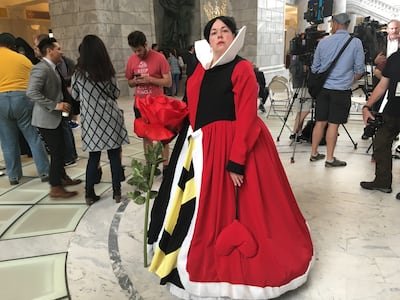 Becca Gunyan poses dressed as the Queen of Hearts from "Alice in Wonderland" during the FanX Salt Lake Comic Convention press conference on Wednesday, April 11, 2018, at the Utah State Capitol.