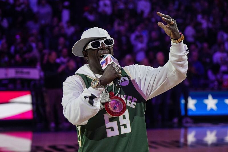 American rapper Flavor Flav performs the national anthem before an NBA basketball game on Oct. 29, 2023, in Milwaukee.