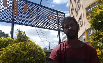 Wubeshet Abebaw sits outside the Sitota Center for Mental Health Care in Addis Ababa, Ethiopia. Abebaw has received in-patient treatment at the center twice.