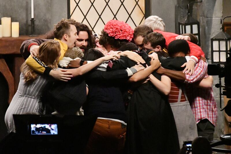 Kenan Thompson hugs the cast of "Studio C" at the end of the taping of "Studio C Live from NYC" in the Manhattan Center's Hammerstein Ballroom on Aug. 24, 2018 in New York City.