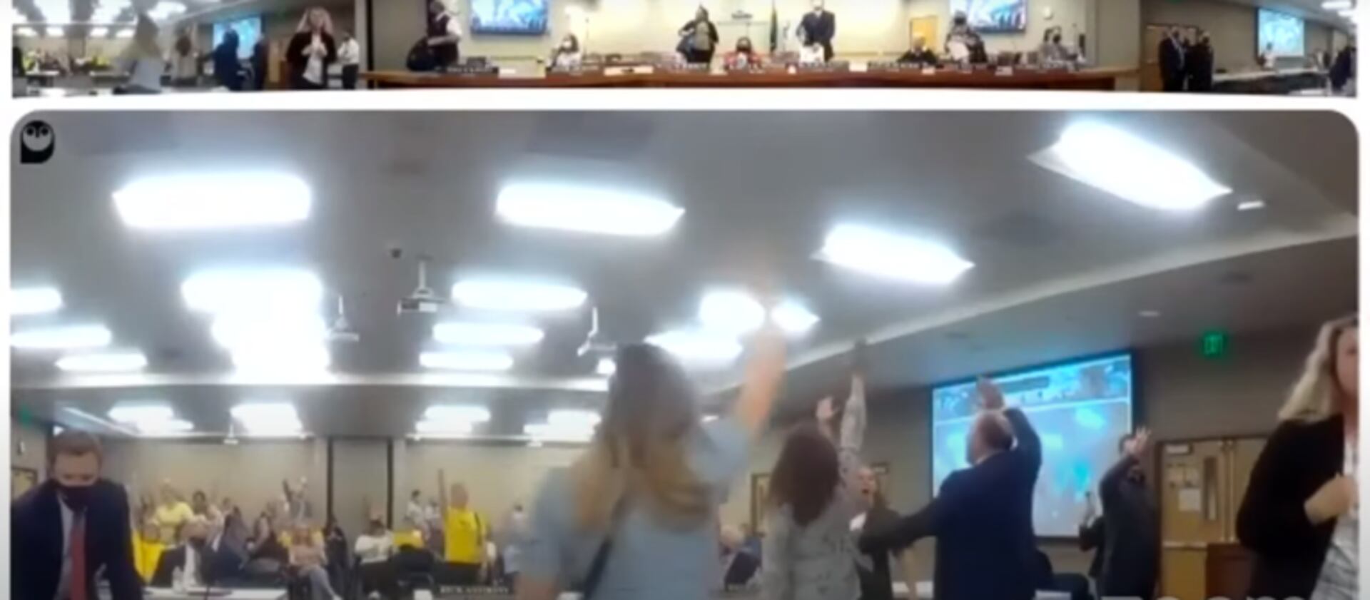 A group of attendees disrupt a Granite Board of Education meeting in South Salt Lake on May 4, 2021.