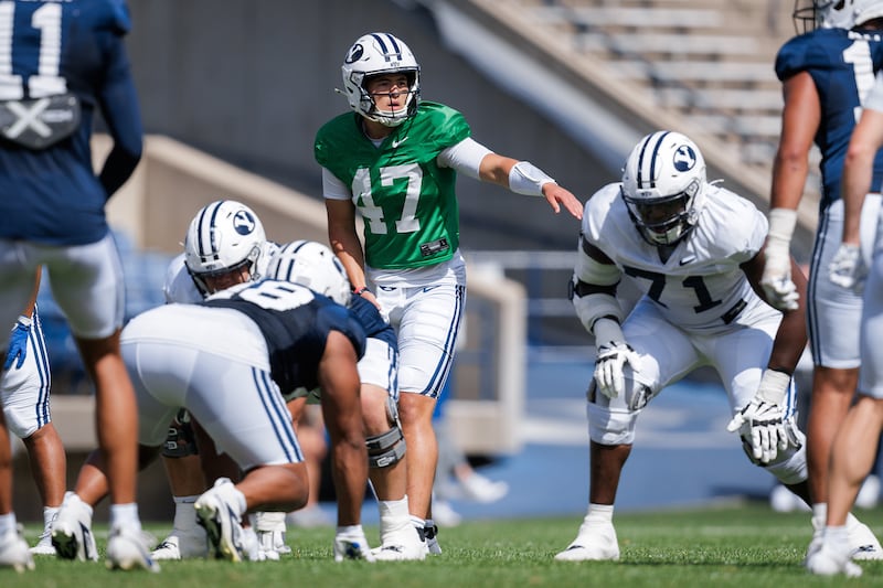 Freshman quarterback Bear Bachmeier (47) lines up the offense during scrimmage at LaVell Edwards Stadium Saturday, Aug. 16, 2025.