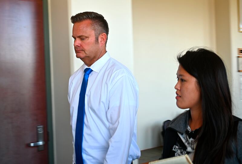In this Friday, Feb. 21, 2020, photo, Chad Daybell walks into court in Lihue, Hawaii.