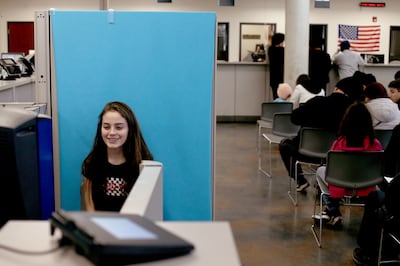 Jessica Swensen has her photograph taken for her driver's license at the driver license division in West Valley City on Wednesday, Jan. 30, 2019.