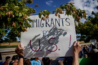 Stan Holmes, of Salt Lake City, holds a sign at a "Close the Camps" vigil organized by Jewish groups outside the U.S. Immigration and Customs Enforcement field office in West Valley City on Saturday, Aug. 10, 2019.