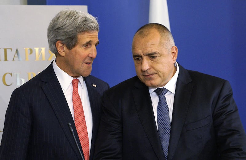 FILE - In this Jan. 15, 2015 file photo, U.S. Secretary of State, John Kerry, left, talks with Bulgarian Prime Minister, Boyko Borisov, before holding a joint news conference in Sofia, Bulgaria Thursday, Jan. 15, 2015. Kerry visited Bulgaria to push for