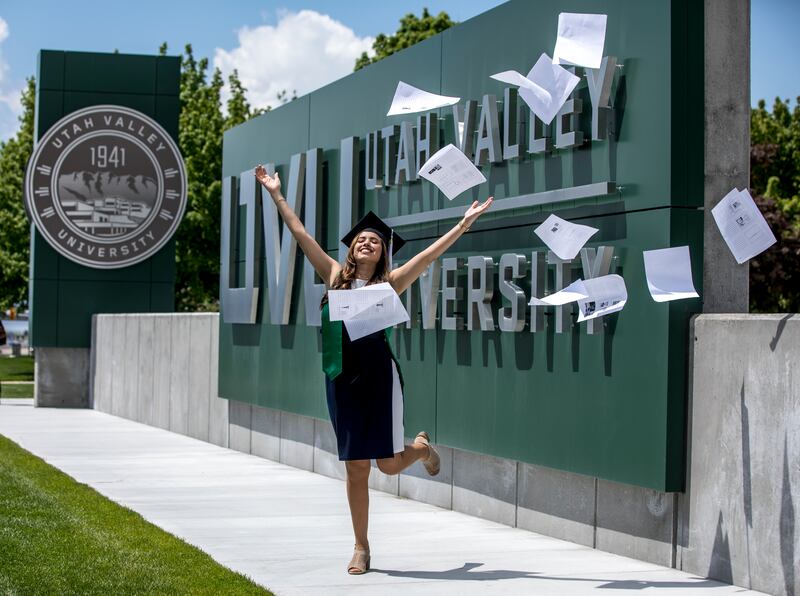 Mayra Gonzalez poses for a picture at Utah Valley University before the start of convocation on the UVU campus in Orem, Utah on Thursday, May 3, 2018.