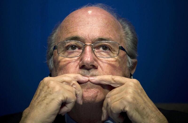 FIFA President Sepp Blatter gestures during a press conference at the FIFA headquarters in Zurich, Switzerland, Friday, March 30, 2012. Blatter promised that football's governing body will change the way it investigates corruption. FIFA's single-chamber e