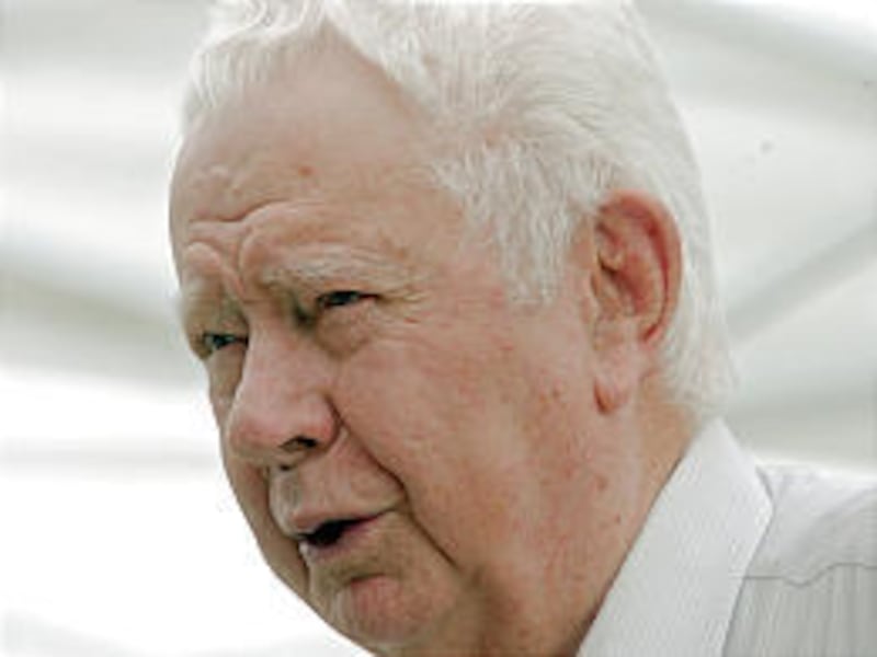 Clarence Robison, shown here in 2006, helped elevate the BYU track and field teams during his 40 years as coach. Robison passed away Monday evening.