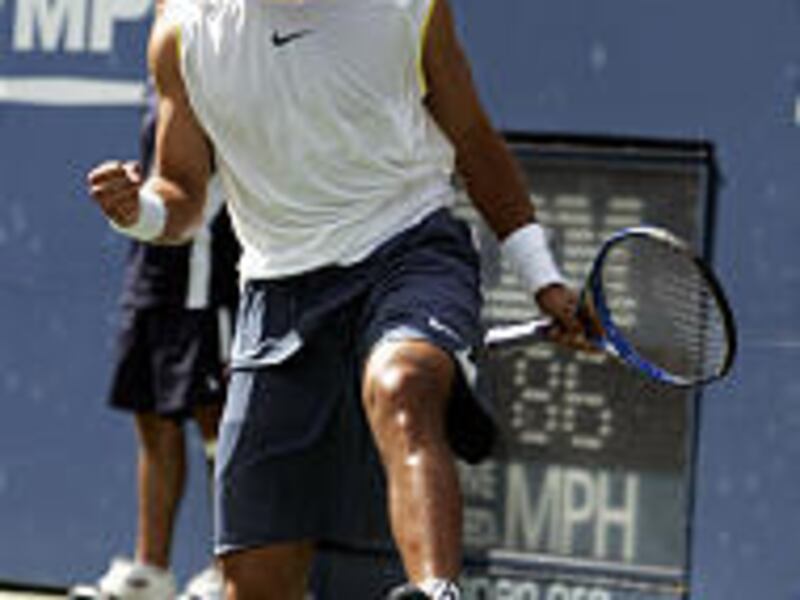 James Blake reacts during his win over second-seeded Rafael Nadal at the U.S. Open.