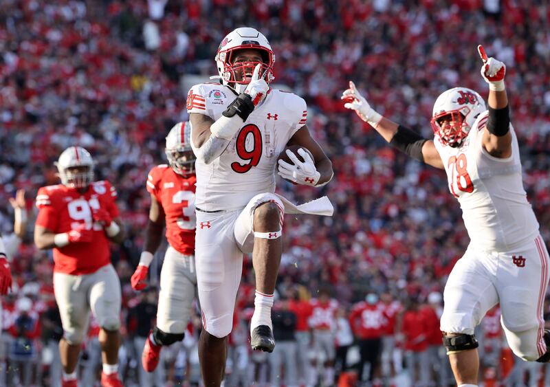 Utah running back Tavion Thomas scores against Ohio State in the 108th Rose Bowl game in Pasadena, California, Jan. 1, 2022.