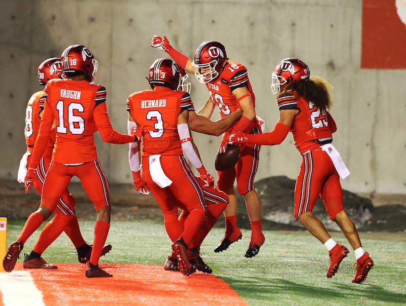 Utah Utes wide receiver Britain Covey celebrates a kick return for touchdown.