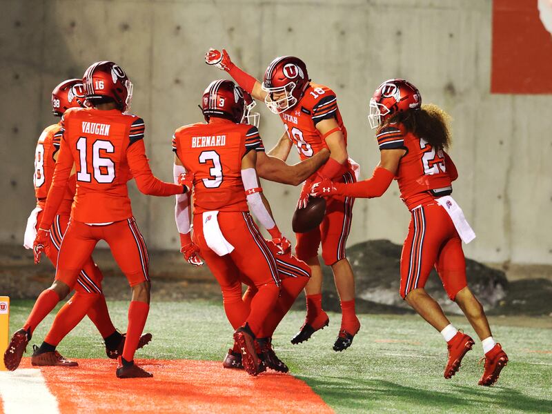 Utah Utes wide receiver Britain Covey celebrates a kick return for touchdown.