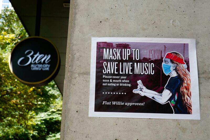 A sign in Texas requesting masks be worn.