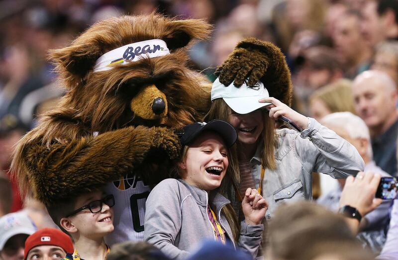 The Jazz Bear gets a photo with a group of fans as the Jazz and the Hornets play at Vivint Smart Home Arena in Salt Lake City, Utah won 105-98 on Saturday, Feb. 4, 2017.
