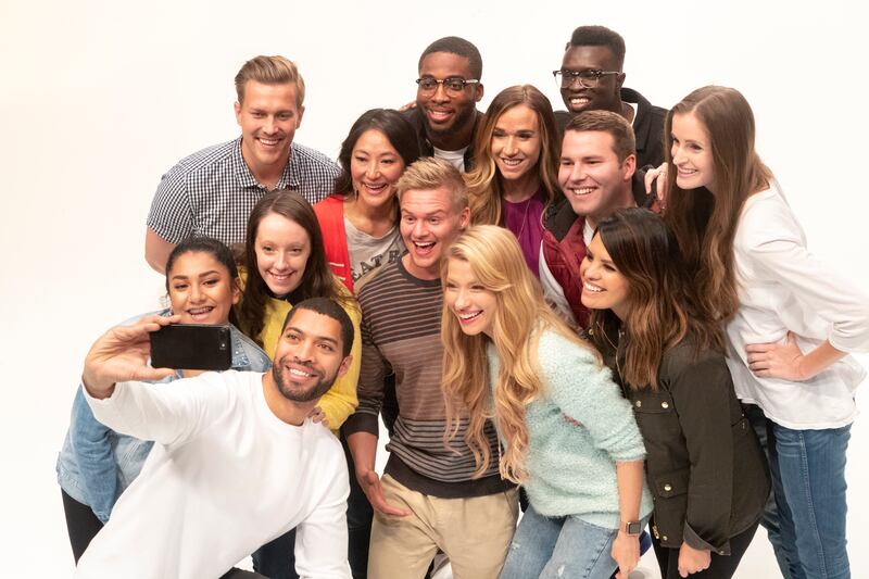 A group of Utah millennials pose for a photo.