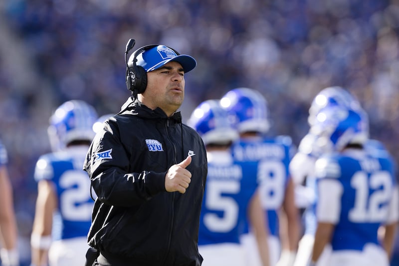 BYU receivers coach Fesi Sitake gives a thumbs-up during game against UCF in 2025.
