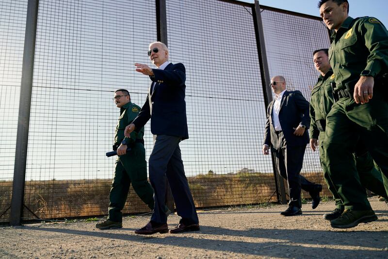 President Joe Biden walks along a stretch of the U.S.-Mexico border in El Paso, Texas, Jan. 8, 2023.