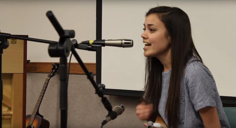 Katie Wishart performs "MRS Minor (Hey Mr. Worthen)" at a ward talent show.