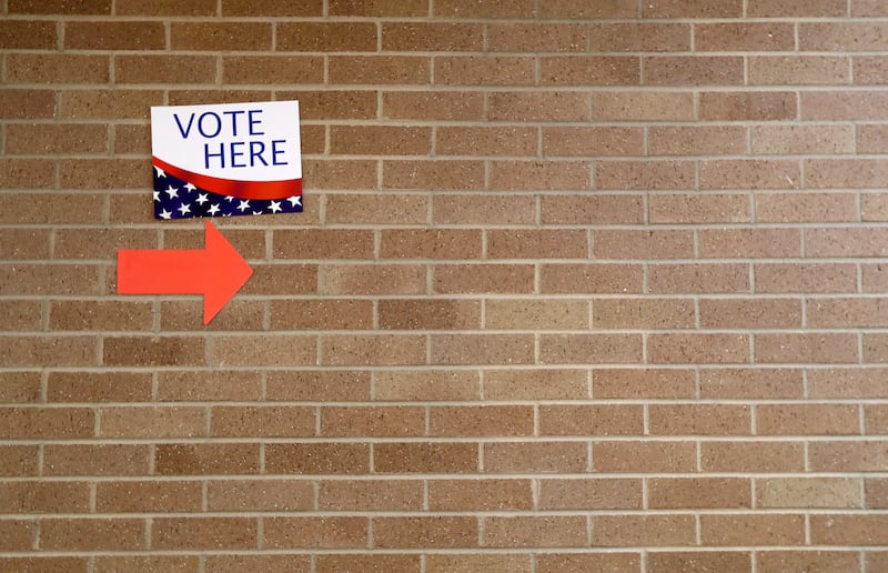 A “Vote Here” sign is pictured on Election Day at the Salt Lake County Government Center in Salt Lake City.
