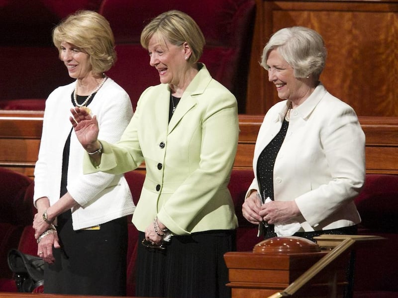 The newly called Young Women presidency, President Bonnie Lee Green Oscarson and her counselors, Sisters Carol Louise Foley McConkie and Evelyn Neill Foote Marriott, on the stand during the afternoon session Saturday, April 6, 2013 of the 183th Annual Gen