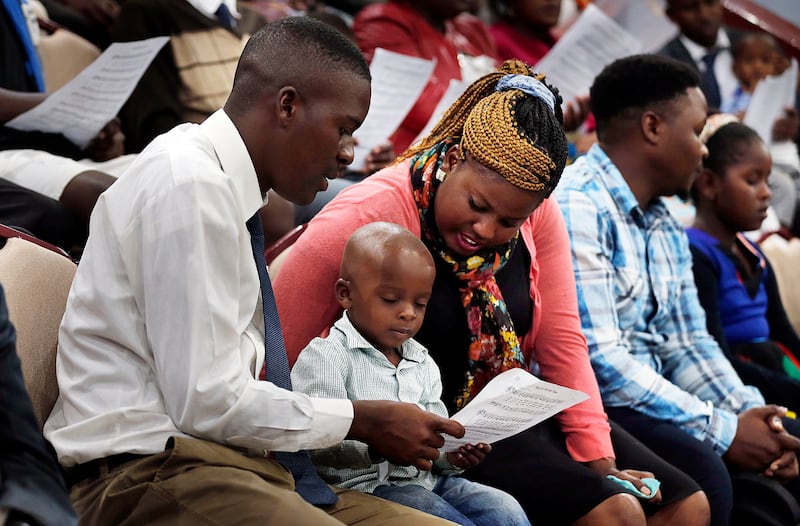 Rashid Agesa, left, Fidel Martial and Ann Kerubo sing during a special devotional with President Russell M. Nelson of The Church of Jesus Christ of Latter-day Saints in Nairobi, Kenya, on Monday, April 16, 2018.