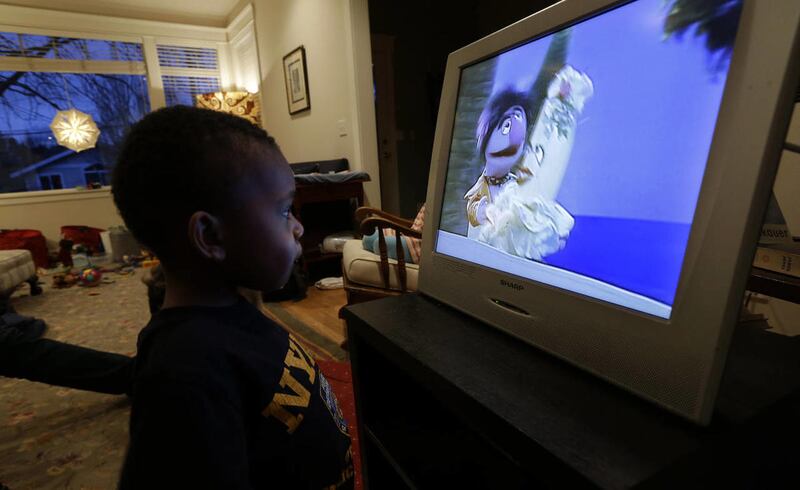 Joe Jensen, 2, watches television as a special treat in the afternoon, Tuesday, Feb. 12, 2013 at his home in Seattle.